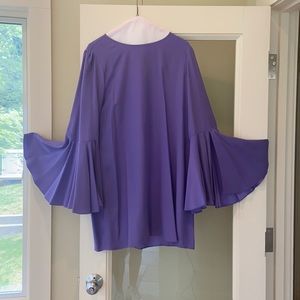 Mini shift;lined. detail on the loose sleeves